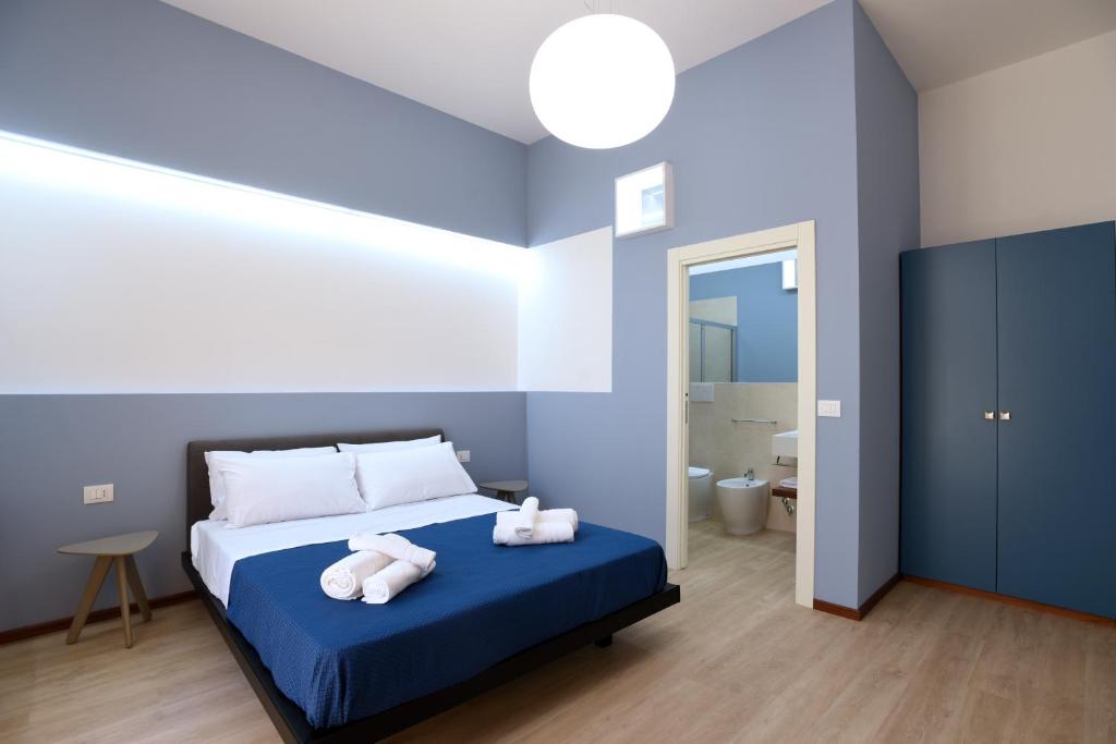 Postel nebo postele na pokoji v ubytování LecceMia B&B