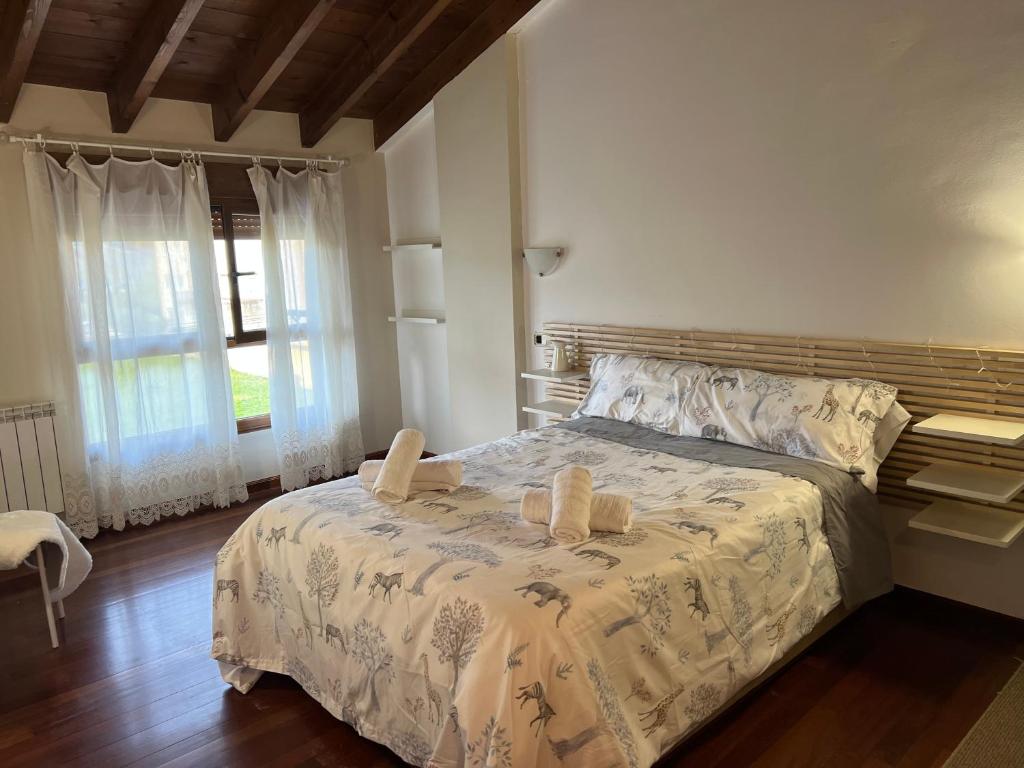 Postel nebo postele na pokoji v ubytování Apartamento el Remiendu Pegau