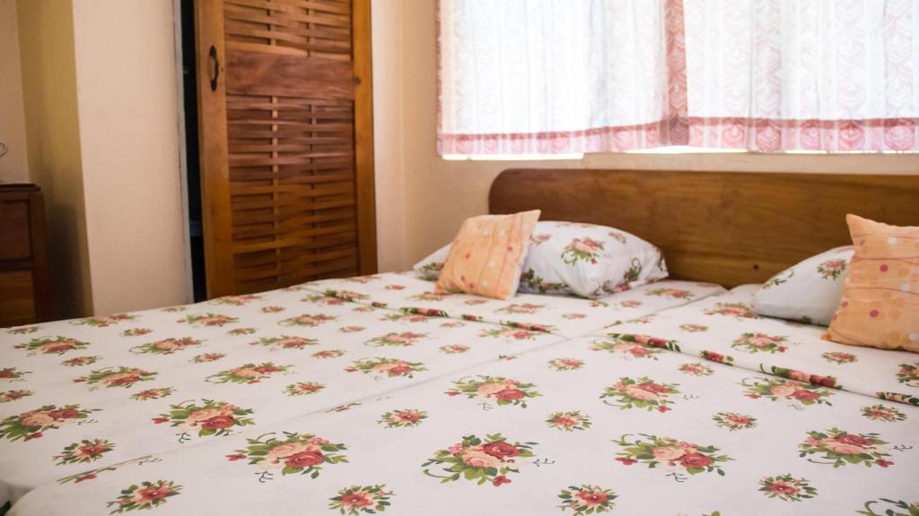 Postel nebo postele na pokoji v ubytování House of Erabo