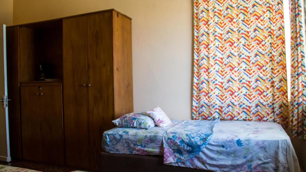 Postel nebo postele na pokoji v ubytování House of Erabo