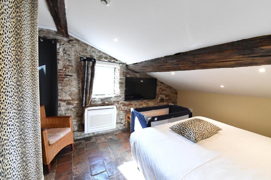 Postel nebo postele na pokoji v ubytování Europe Hôtel