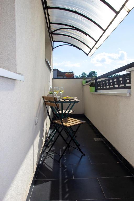 Balkón nebo terasa v ubytování Apartman MIA Centar