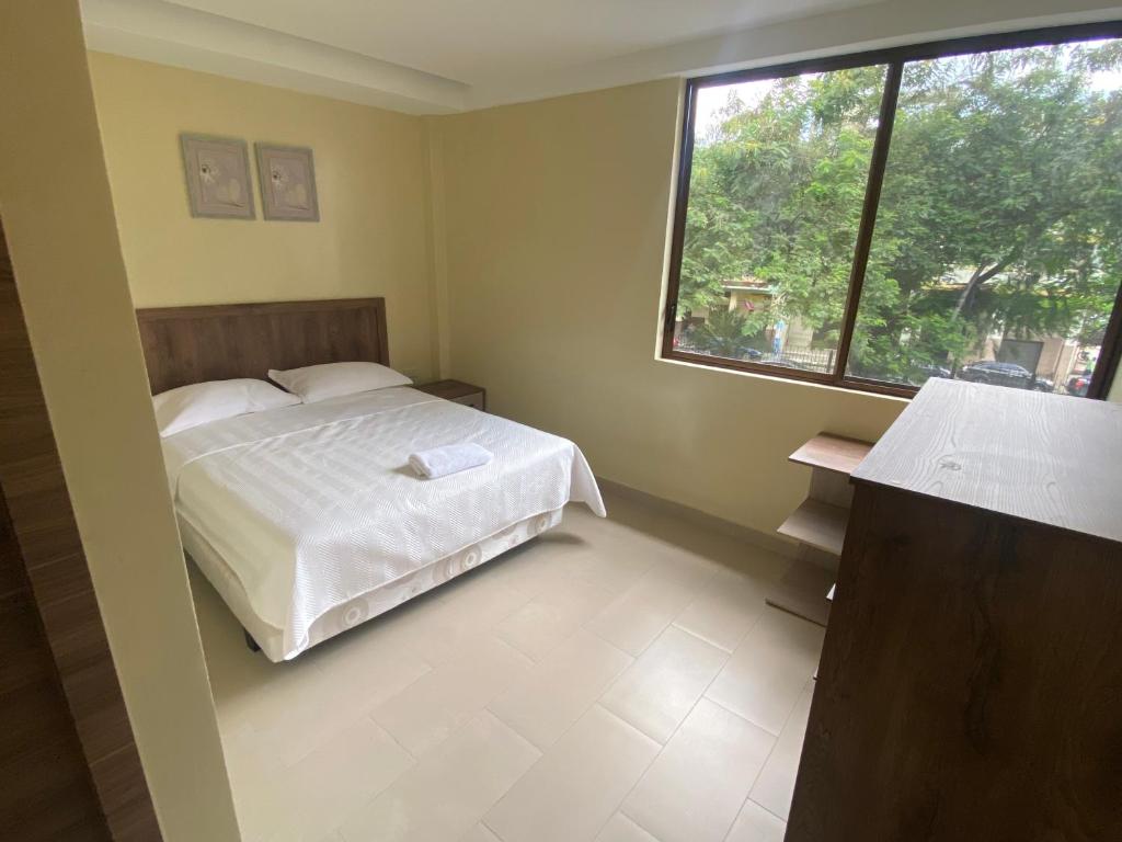 Postel nebo postele na pokoji v ubytování Hotel Sada