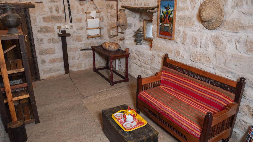 Posezení v ubytování نزل كوفان التراثي Koofan Heritage Lodge