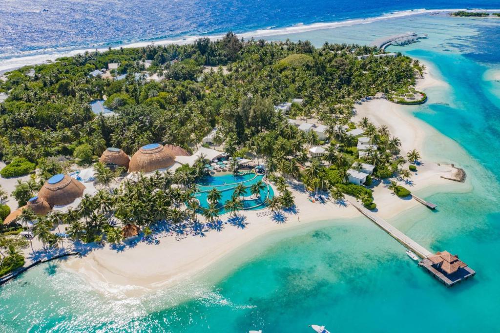 an aerial view of an island in the ocean at Holiday Inn Resort Kandooma Maldives - Kids Stay & Eat Free and DIVE FREE for Certified Divers for a minimum 3 nights stay in Guraidhoo