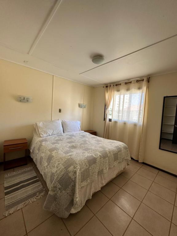 Postel nebo postele na pokoji v ubytování Cabañas Florencia La Serena