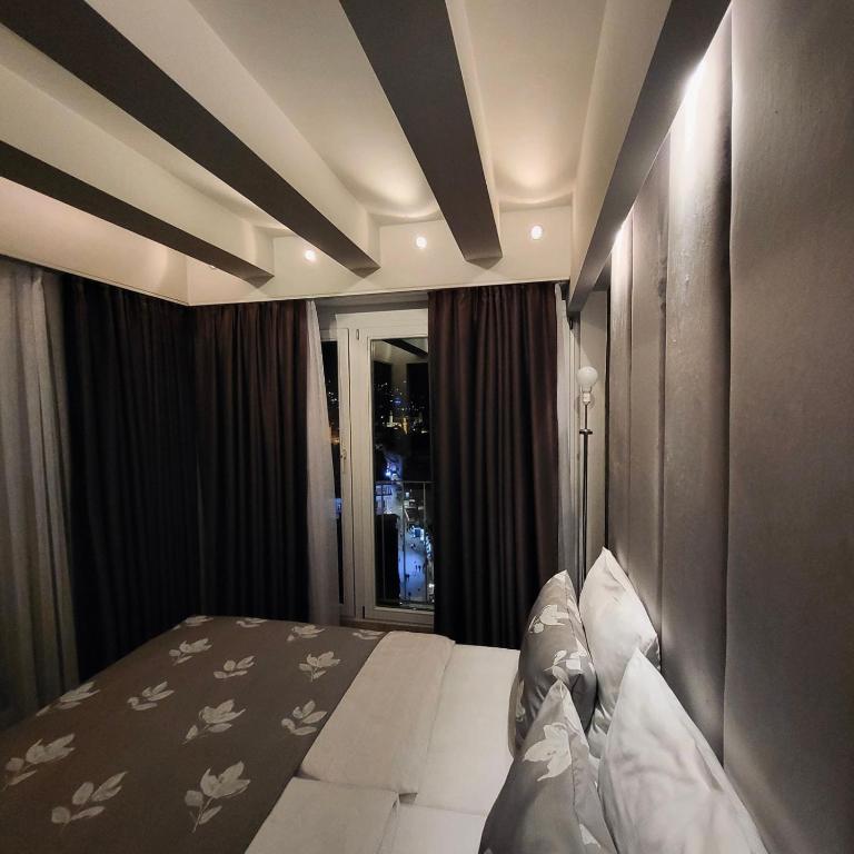 Postel nebo postele na pokoji v ubytování Hotel City View Deluxe