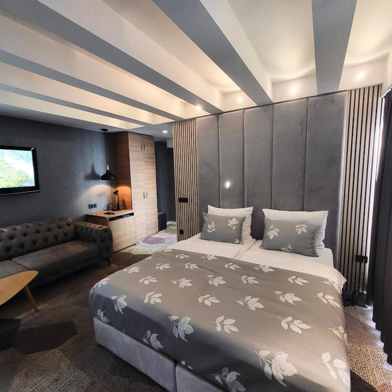 Postel nebo postele na pokoji v ubytování Hotel City View Deluxe