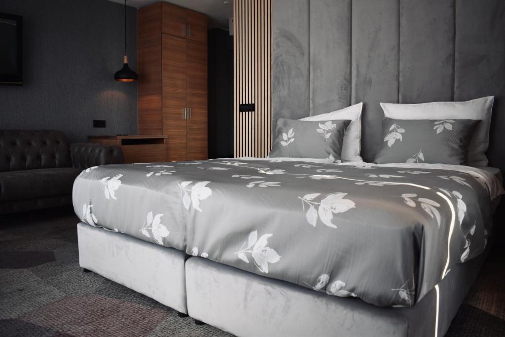 Postel nebo postele na pokoji v ubytování Hotel City View Deluxe