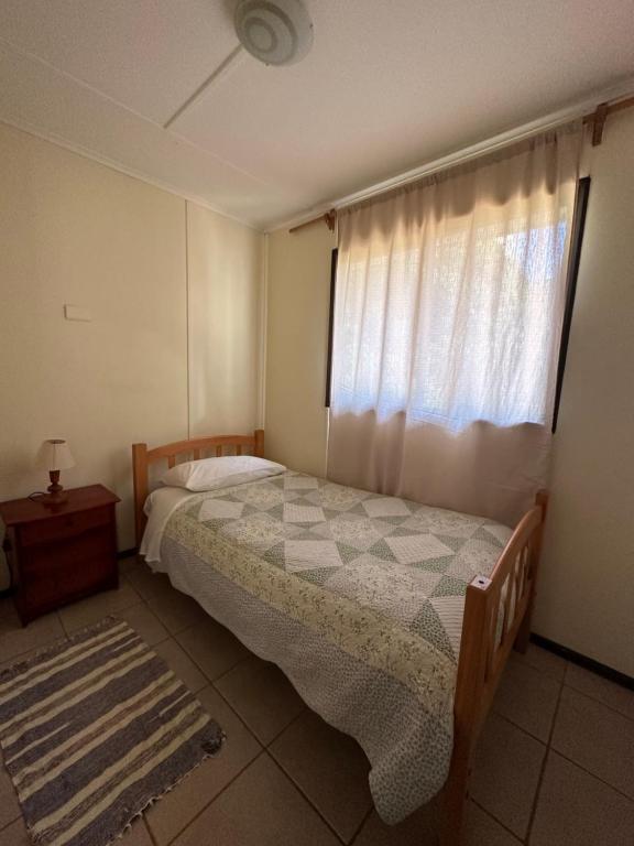 Postel nebo postele na pokoji v ubytování Cabañas Florencia La Serena