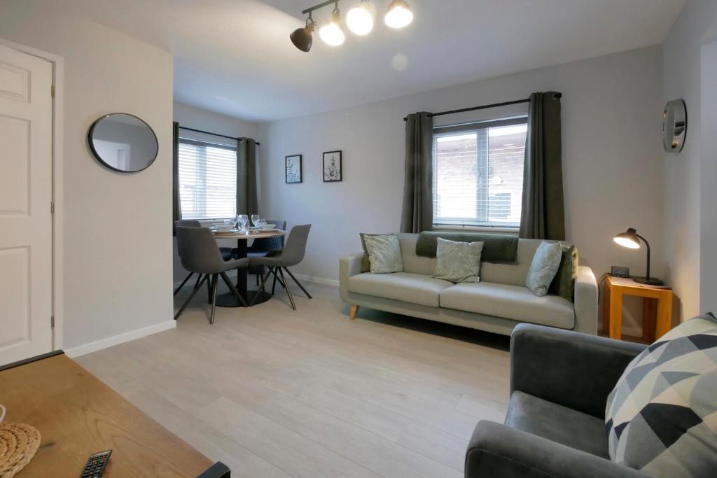 a living room with a couch and a table at Crewe Short Lets 6 Victoria Court, Crewe in Crewe