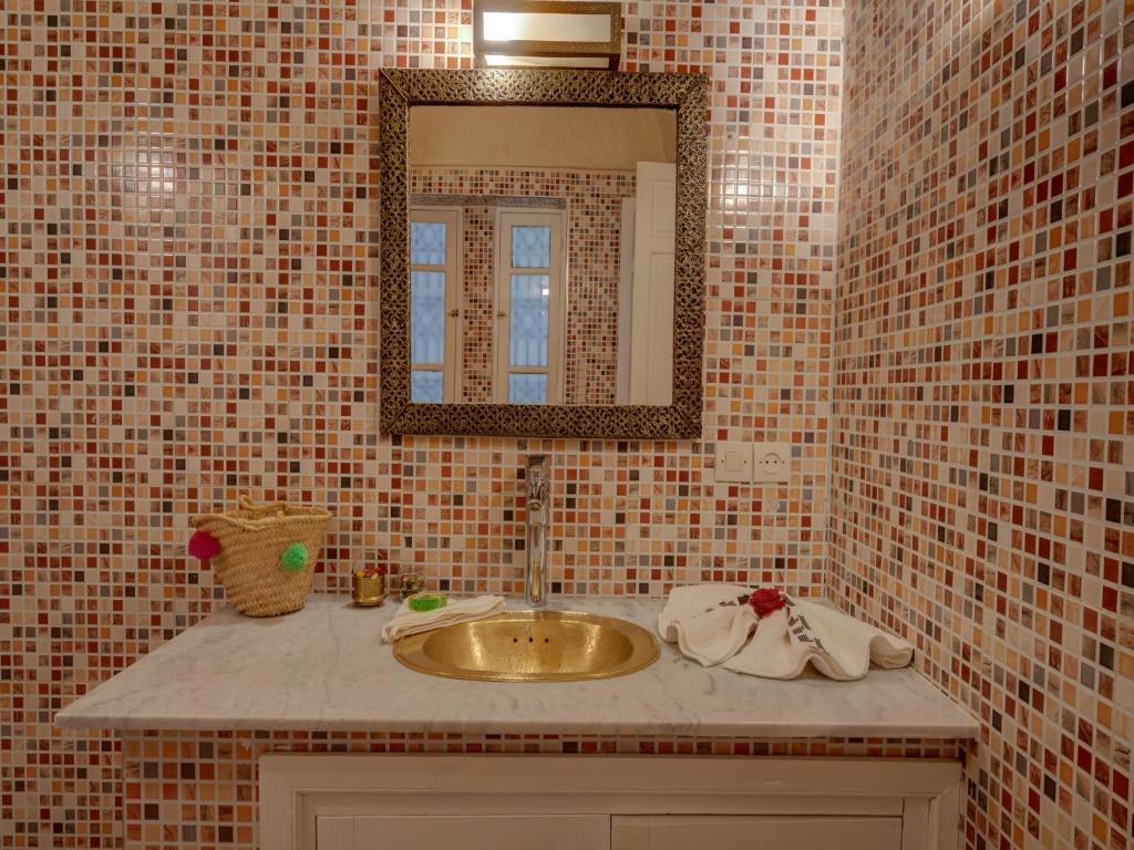Koupelna v ubytování Riad Princesse Du Désert & Spa