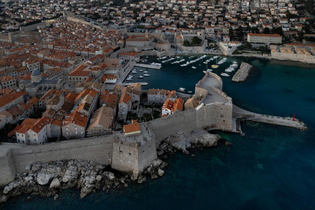 an aerial view of a city with a castle in the water at Stayeva 11 in Dubrovnik