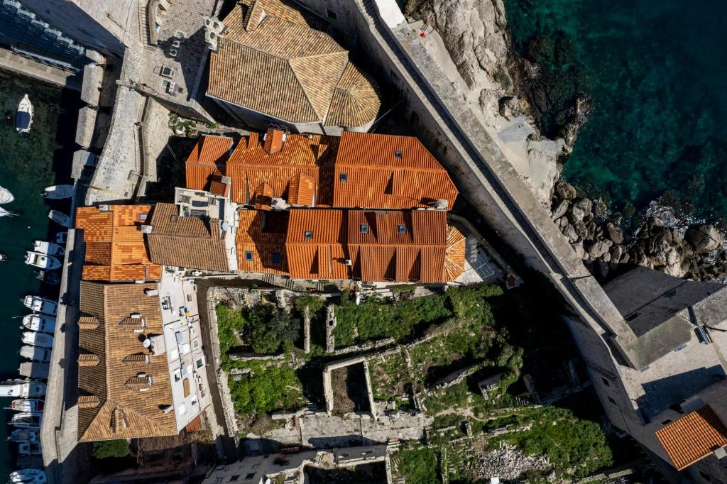 an aerial view of a large house with red roof at Stayeva 11 in Dubrovnik
