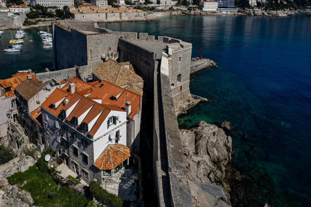 an aerial view of a building on the water at Stayeva 11 in Dubrovnik
