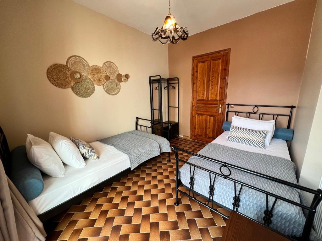 Postel nebo postele na pokoji v ubytování Antonios House Ithaka