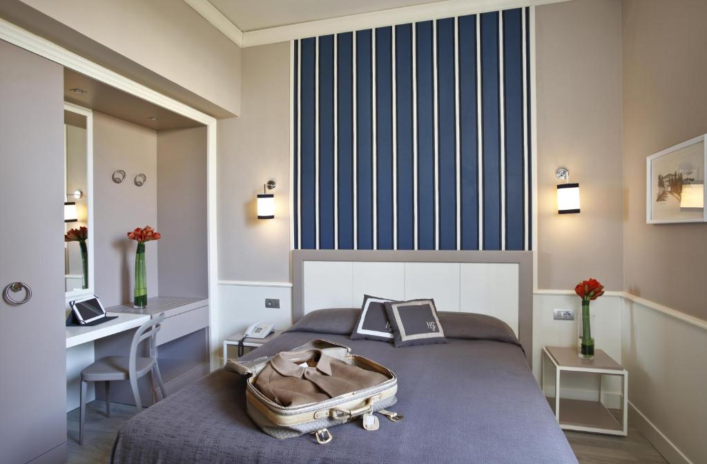Łóżko lub łóżka w pokoju w obiekcie Hotel Golf