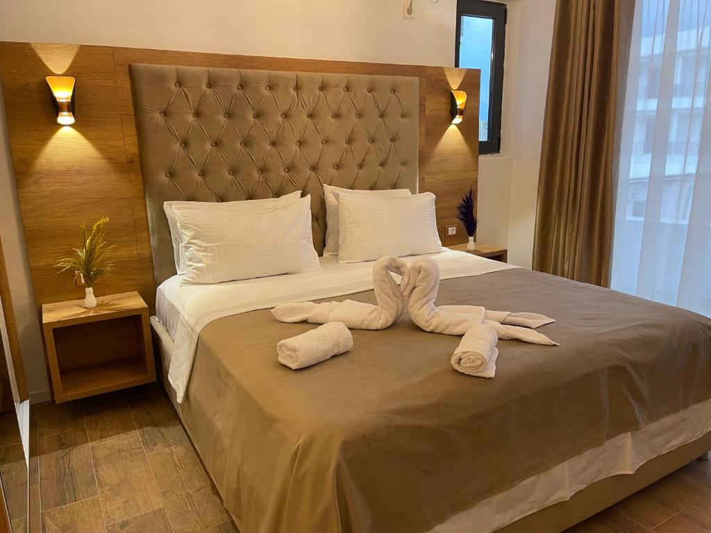 Postel nebo postele na pokoji v ubytování Apartments Miri