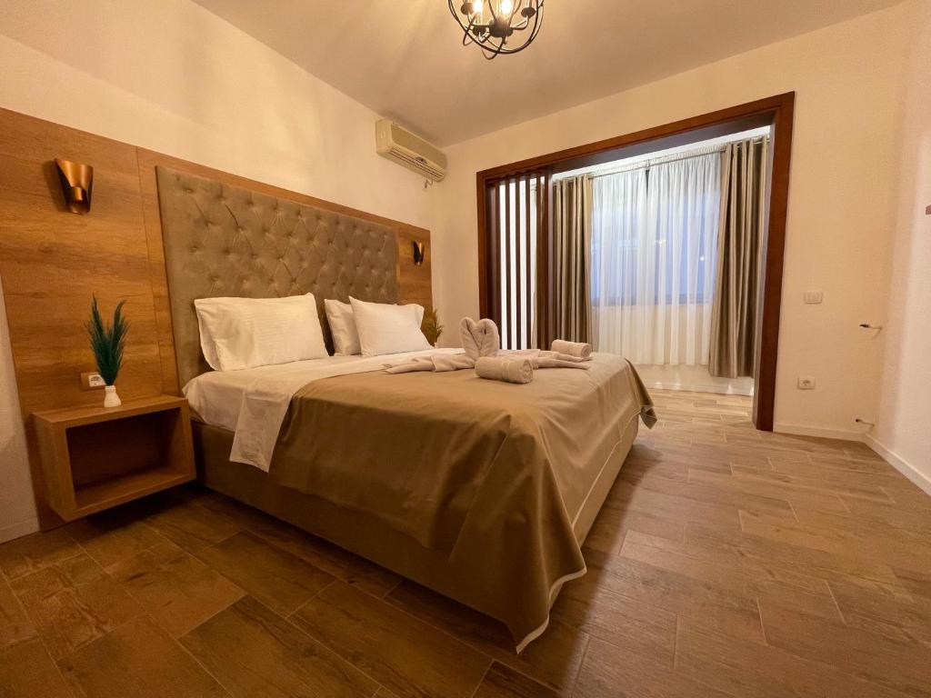 Postel nebo postele na pokoji v ubytování Apartments Miri