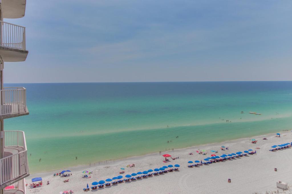 a view of a beach with people and umbrellas at Shores of Panama 1318 in Panama City Beach