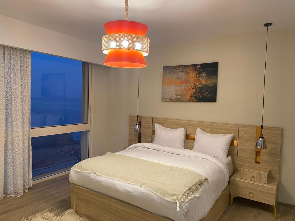 Postel nebo postele na pokoji v ubytování Il monte galala Sea view Chalet المونت جلاله