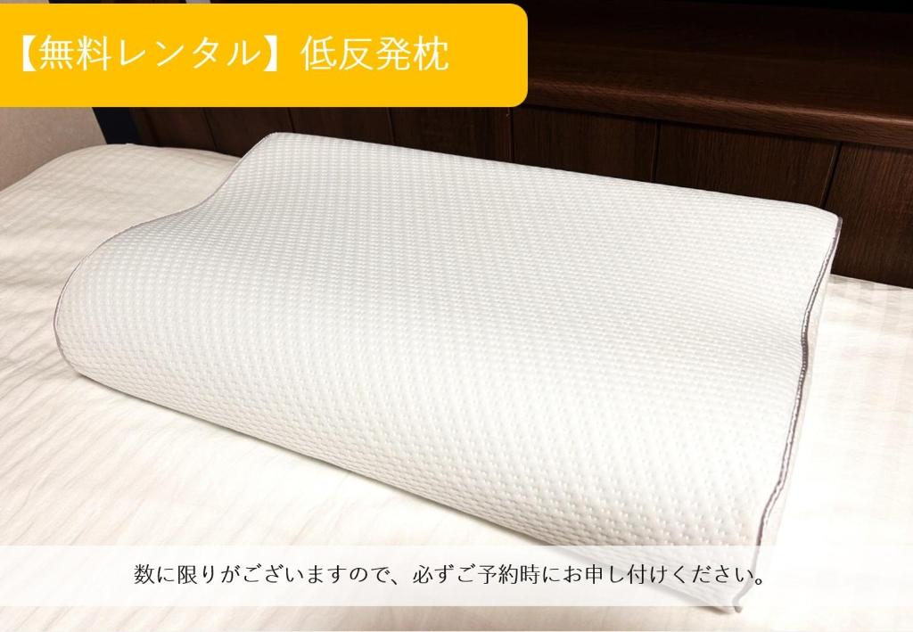 Postel nebo postele na pokoji v ubytování ゲストハウス　京粋庵　東福寺