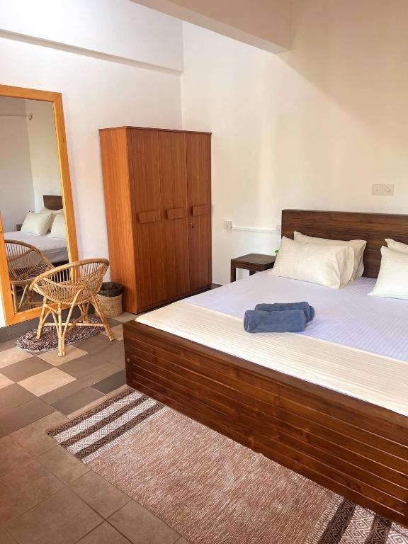 Postel nebo postele na pokoji v ubytování Hummus Hostel Hikkaduwa