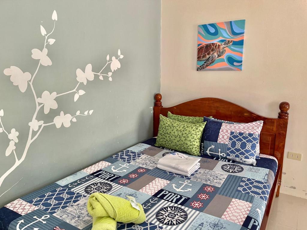 Postel nebo postele na pokoji v ubytování D' Partner's Inn
