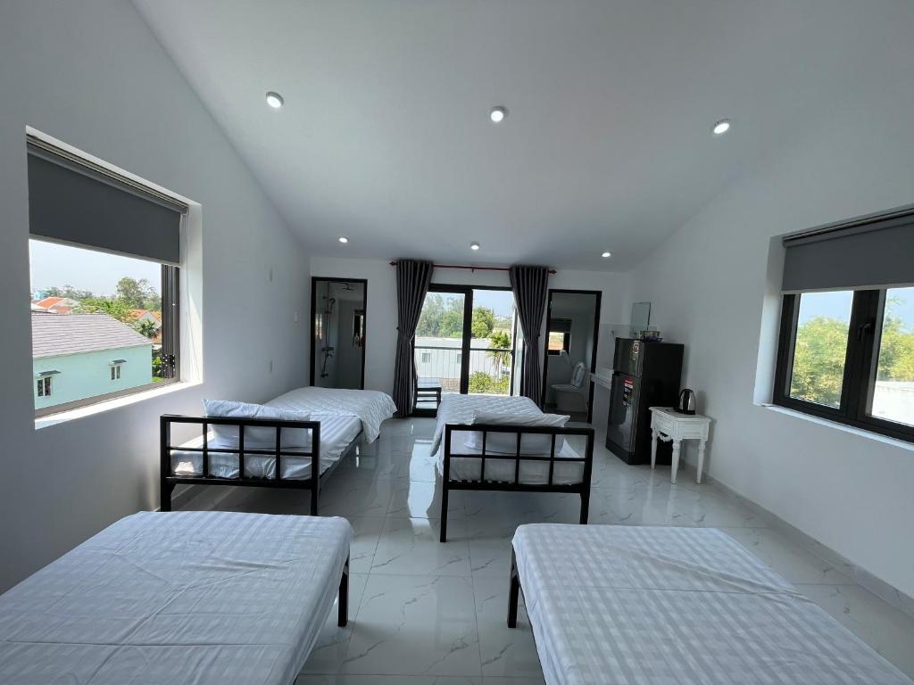 Postel nebo postele na pokoji v ubytování Moon house villa
