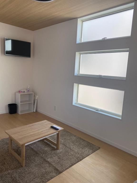TV a/nebo společenská místnost v ubytování Guest House DARUMA