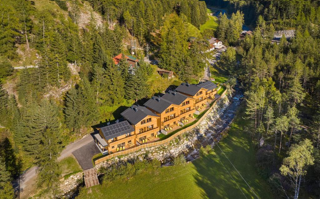 an aerial view of a house on a mountain at Chalet Stuibenfall Niederthai in Umhausen
