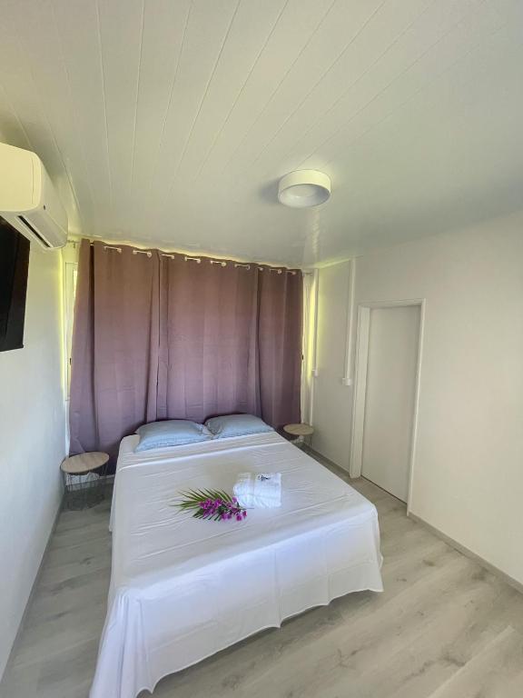 Postel nebo postele na pokoji v ubytování Temana Airport Faa'a,Tahiti