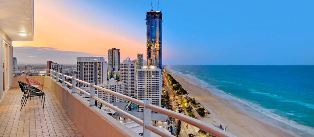 a balcony with a view of the beach and the ocean at Zenith Ocean Front Apartments in Gold Coast