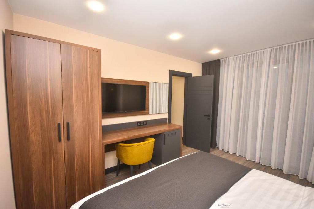 Postel nebo postele na pokoji v ubytování Batumi View Luxury