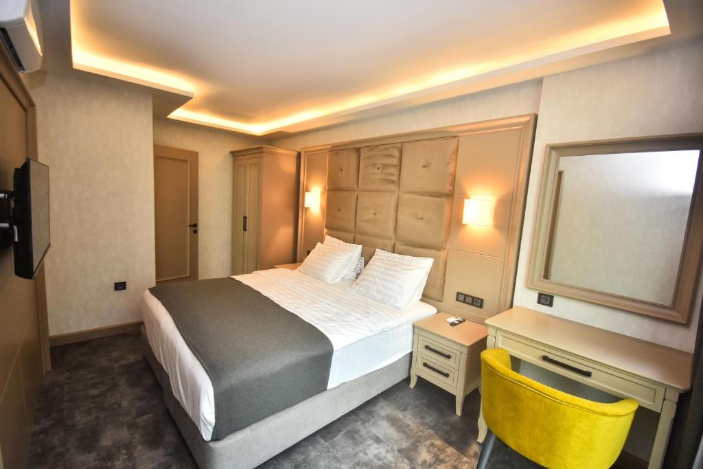 Postel nebo postele na pokoji v ubytování Batumi View Luxury