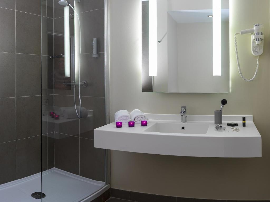Koupelna v ubytování Best Western Plus Hôtel & Spa de Chassieu
