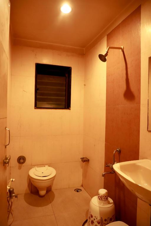 Koupelna v ubytování Hotel Sachin