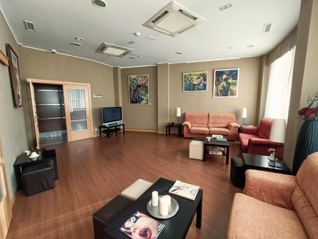 TV a/nebo společenská místnost v ubytování Hotel Palacio Congresos