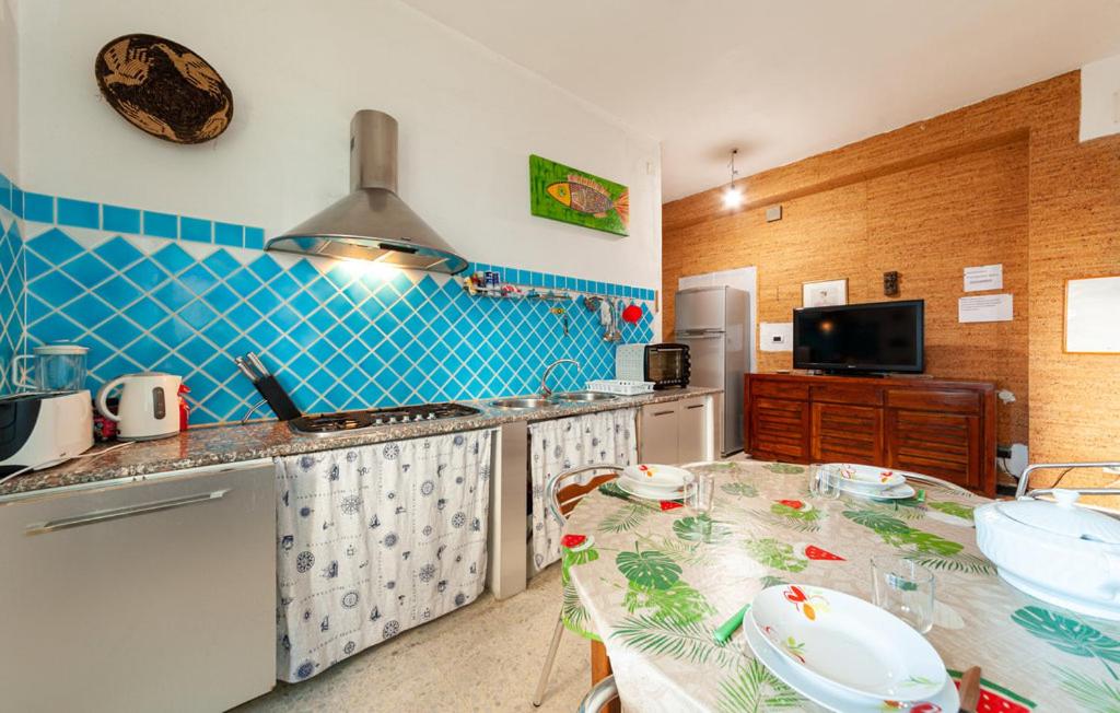 Kuchyň nebo kuchyňský kout v ubytování Tempio Pausania Solar private apartment 30 minutes from the sea - Appartamento solare a 30 minuti dal mare