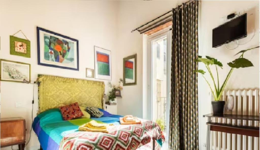 Posteľ alebo postele v izbe v ubytovaní Arimatea Casa Vacanza