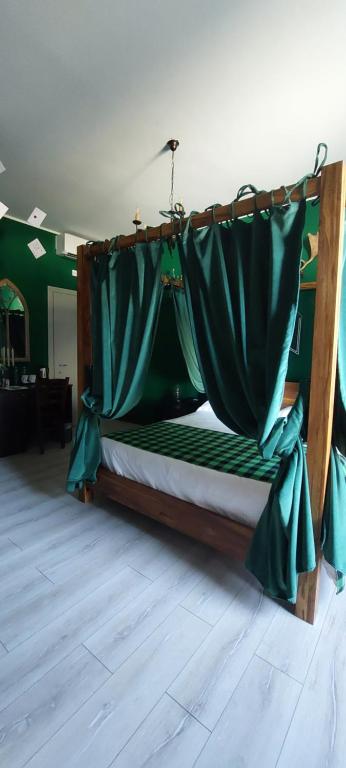 Postel nebo postele na pokoji v ubytování Binario Magic RistoHotel