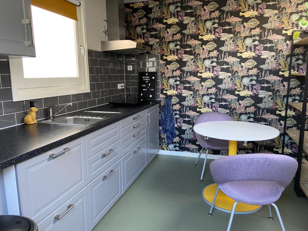 Kuchyň nebo kuchyňský kout v ubytování Sfeervol guesthouse, privé tuin en free parking