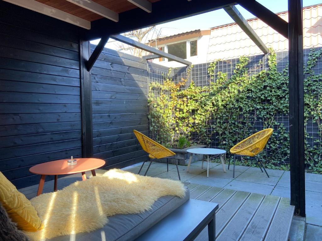 Fotografie z fotogalerie ubytování Sfeervol guesthouse, privé tuin en free parking v Rotterdamu