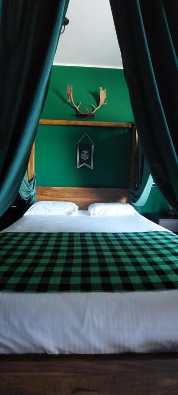 Postel nebo postele na pokoji v ubytování Binario Magic RistoHotel