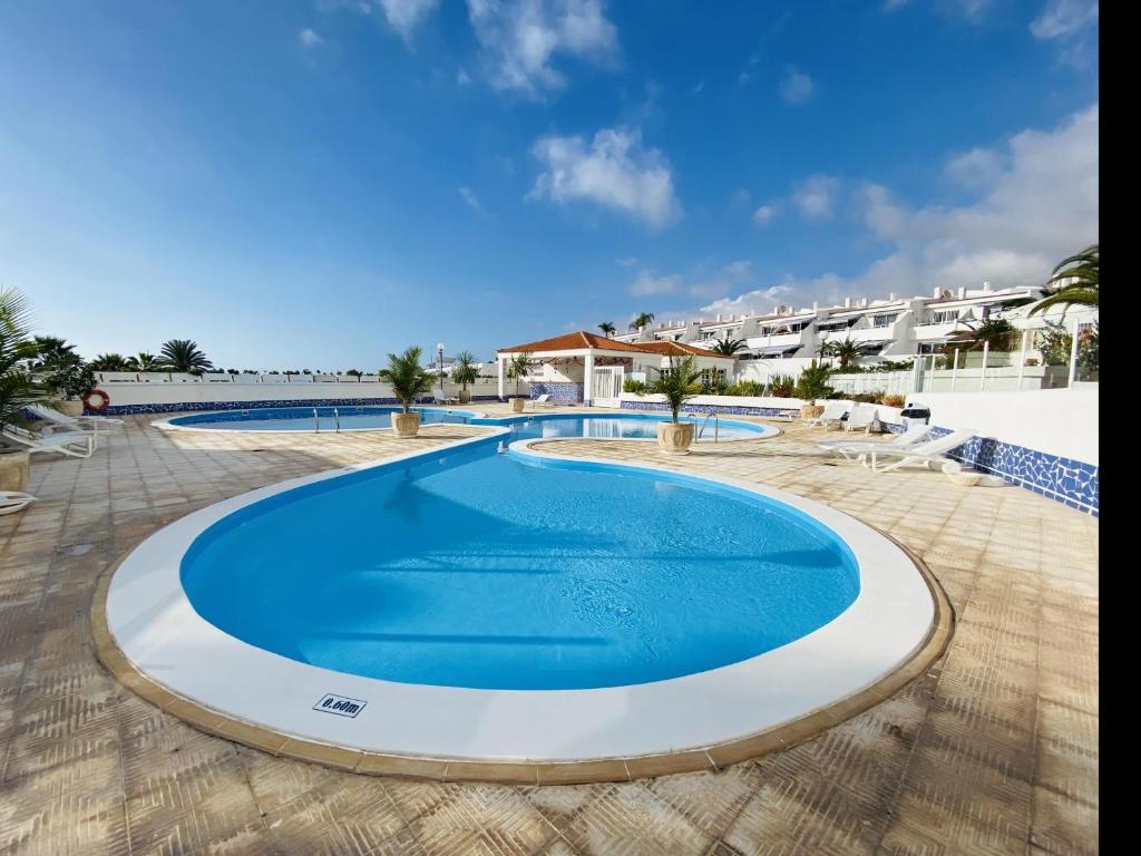 Bazén v ubytování Sol y Luna Holiday Home nebo v jeho okolí