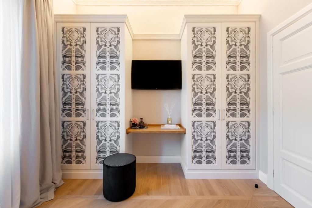 A television and/or entertainment centre at Apartments Florence- Granduca Penthouse
