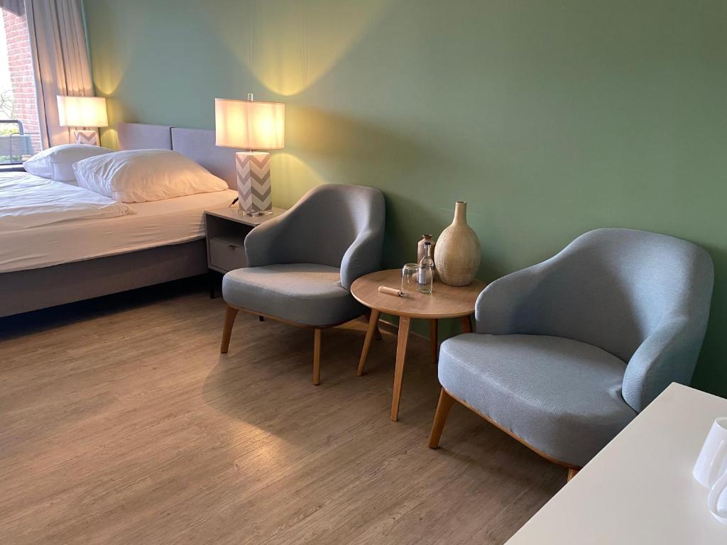 Postel nebo postele na pokoji v ubytování Das Hotel Ostseeblick