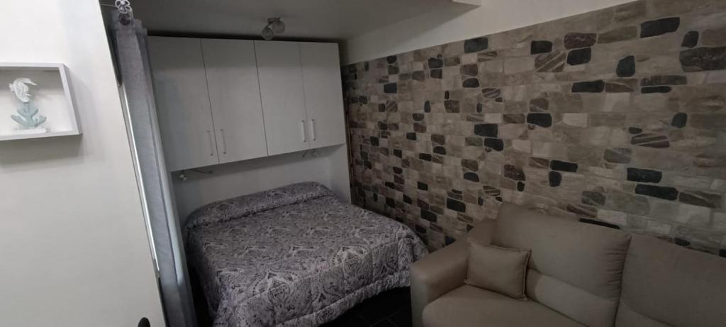 Postel nebo postele na pokoji v ubytování B&B Appartamenti l'Anfora