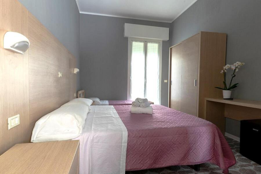 Postel nebo postele na pokoji v ubytování Hotel Kennedy