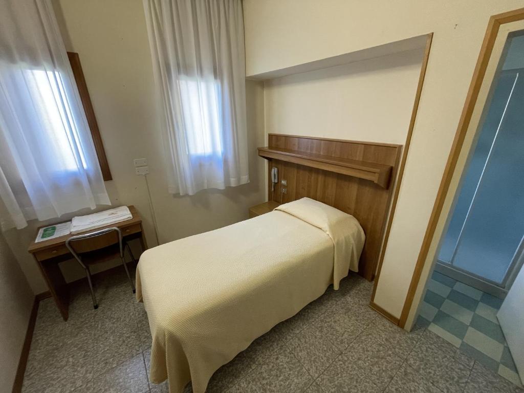 Postel nebo postele na pokoji v ubytování Casa Caburlotto